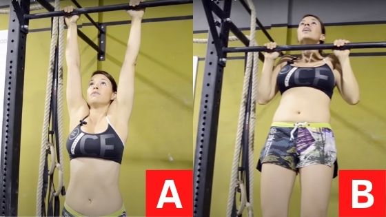 Woman doing pullups in a back workout for women